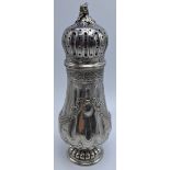 A late 19th century silver caster, bulbous form with twin vacant cartouche, hallmarked London, maker