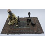 Franz Bergman, study of an Arab on a carpet selling Shabti's, Austrian cold painted bronze, stamps