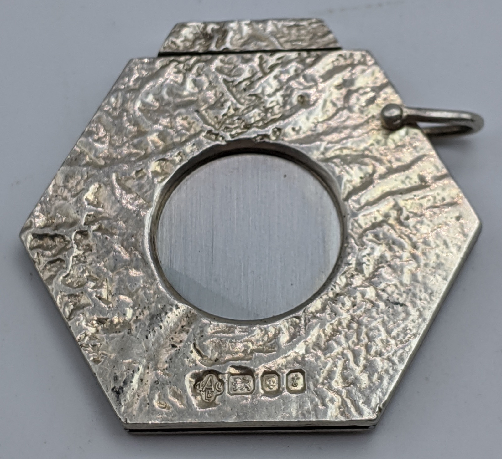 An Aspreys silver cigar cutter, hallmarked London