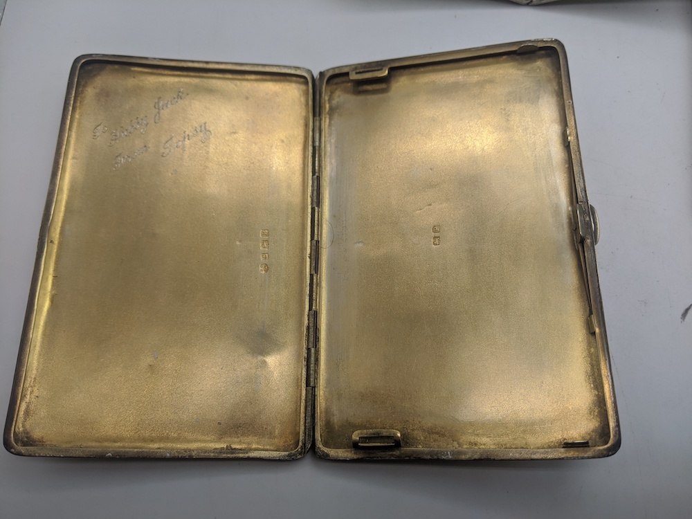 Three early 20th century Deco silver cigarette cases, engine turned outers, gilt interiors, - Image 4 of 5