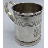 A George I silver tankard, crest to front, Britannia hallmarked, 1716-17, maker William Fleming,