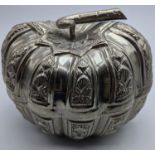 An Eastern white metal box in the form of a squash, H.11cm W.13cm