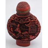 A Chinese late 19th/early 20th century red lacquer snuff bottle, H.6.5cm