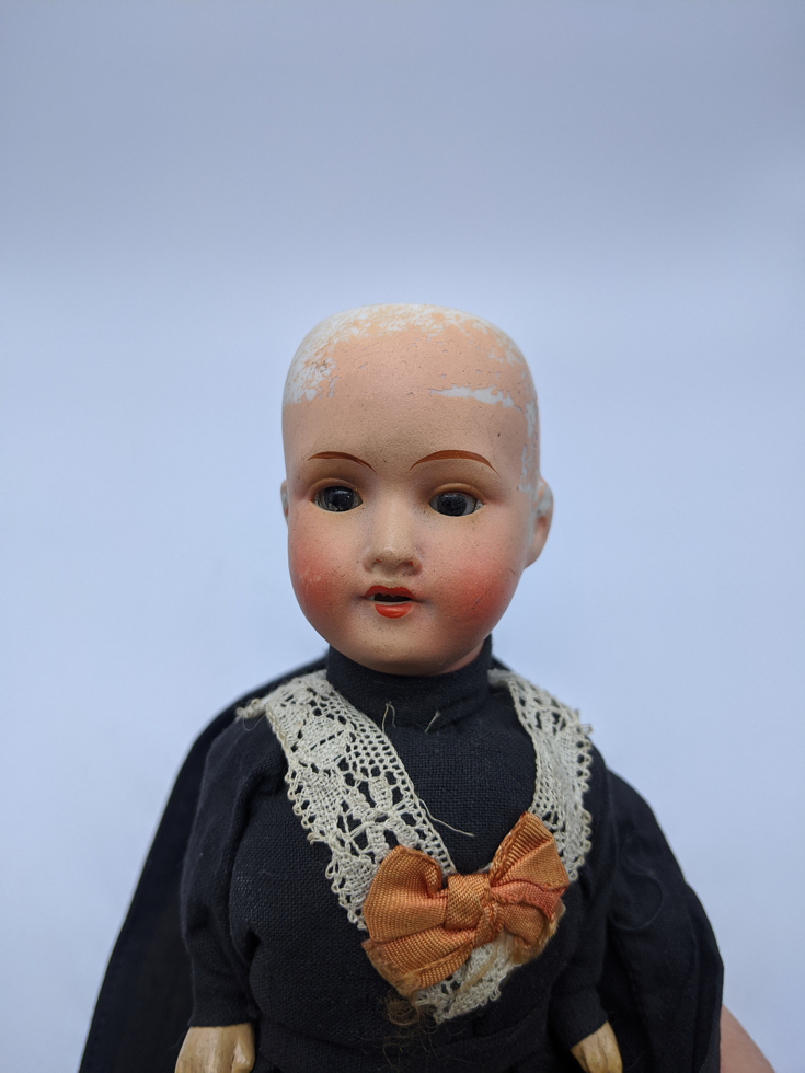 A Unis France 301 bisque doll, H.13cm, an Armand Marseille 309 bisque doll in a black dress with - Image 4 of 4