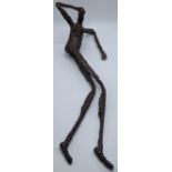 After Alberto Giacometti, a reclining nude study, bronze, L.42cm