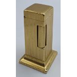 A Dunhill Rollalite gold plated desk lighter, H.6.5cm
