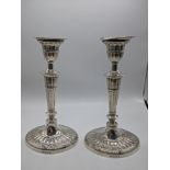 A pair of Edwardian silver candlesticks, hallmarked Birmingham, 1904, maker Barker Brothers,