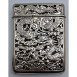 A Chinese late 19th century export silver case, pierced with stylised dragon designs, vacant