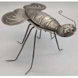 A large Chinese export silver insect with long legs, possibly a moth, butterfly or bee, marks to the