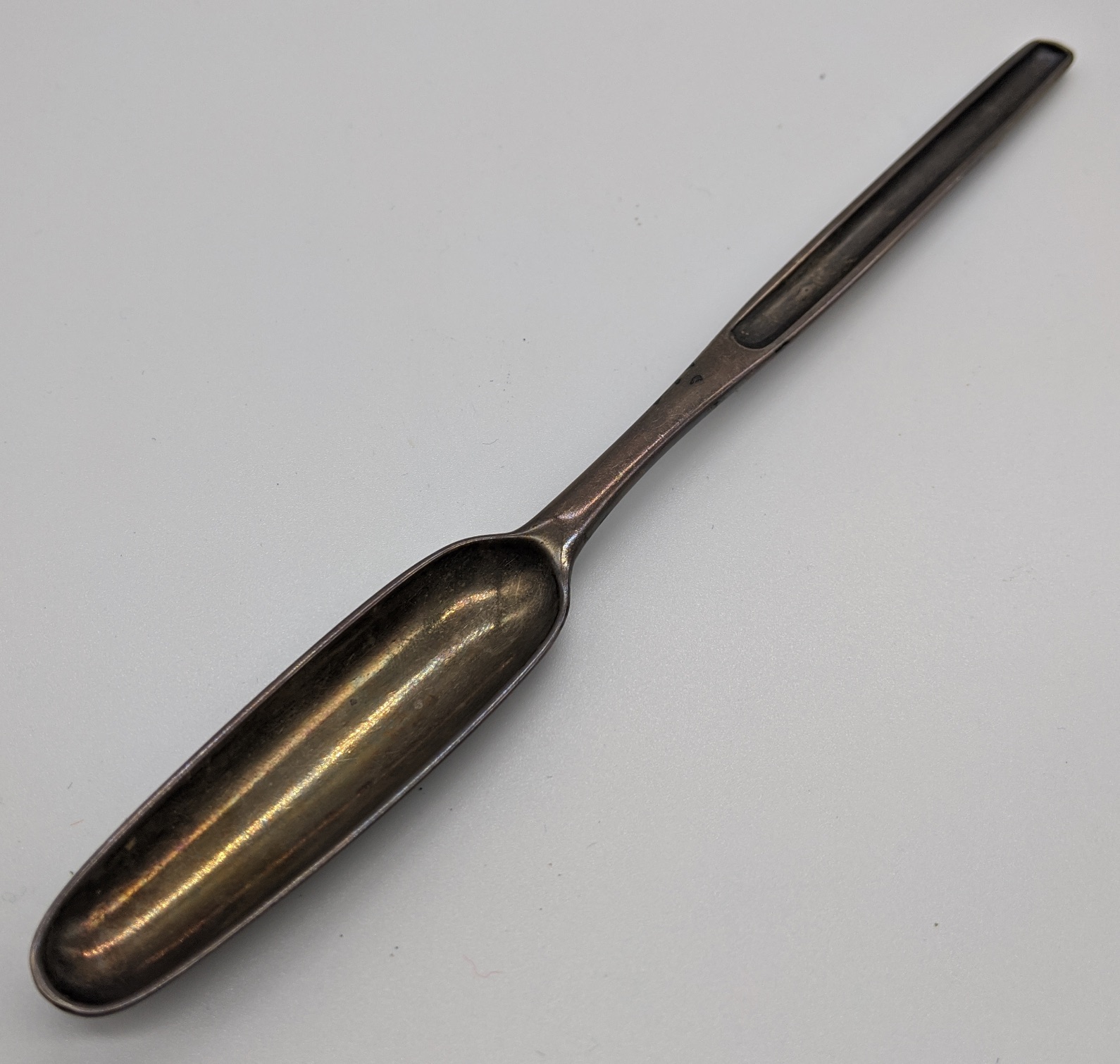 A George II silver bone marrow scoop by Elizabeth Oldfield, hallmarked London, 1752, three letter