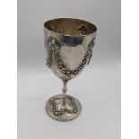A Victorian silver goblet, embossed with grapes, hallmarked London, 1875, , bearing Hebrew