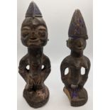 Two 19th century Nigerian tribal wooden figural carvings, Yoruba Ibeji, H.24cm