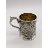 A George IV silver mug, decorated with ivy, gilt interior, hallmarked, 188g, H.8.5cm