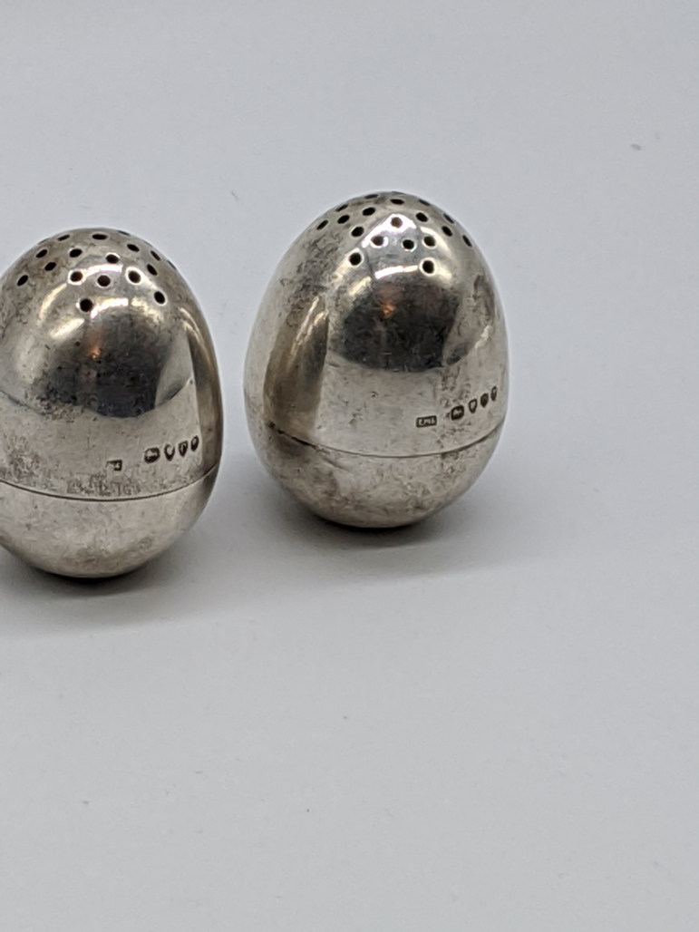 A pair of Victorian silver peppers, hallmarked London, 1878-79 to upper and lower section, maker - Image 3 of 4