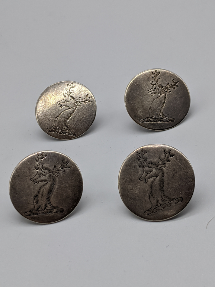 A set of four Georgian Irish silver buttons, stag head crests, hallmarked Dublin, 21g, D.2.5cm