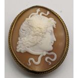 A gilt metal cameo brooch, H.4.5cm