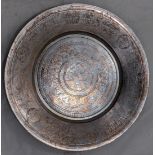 An early 20th century Persian silvered copper bowl, etched with scrolling patterns and animals, D.