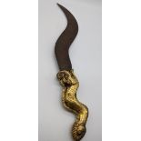 A Tibetan ritual knife or sword with gilded hilt in the shape of a dragon, Tibet, L.37.5cm
