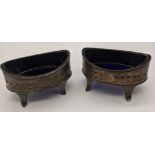 A pair of George III silver salts with blue glass liners, hallmarked London, 1797, maker Henry