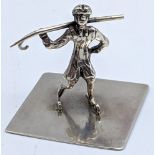 A Russian silver study of a skater, marks to base, H.3cm