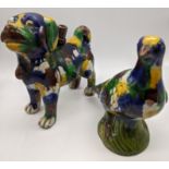 A Chinese Sancai-glazed dog and pigeon, H.18cm L.16cm (dog)