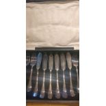 A collection of silver plate flatware