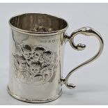 An Edwardian small silver mug, embossed with angels, hallmarked Birmingham, 1902-03, maker L&S, 48g,