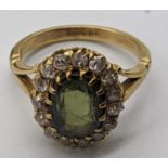An 18ct yellow gold tourmaline and diamond ring