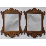 A pair of 19th century mahogany fret cut mirrors