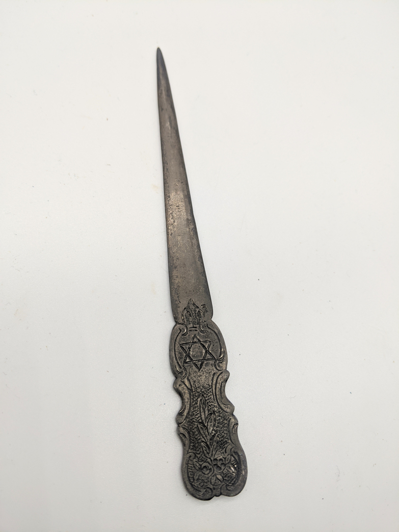 A silver letter opener, engraved with the Star of David, stamped 800, L.14cm