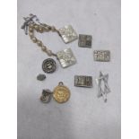 A collection of brooches, tallit clip, medallion, mostly silver