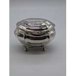 An Edwardian silver tea caddy, hallmarked London, 1904-05, maker Goldsmiths, 174g, H.8cm W.11.5cm