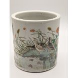A Chinese 18th century famille verte brush pot depicting a scene of ducks and floral designs,