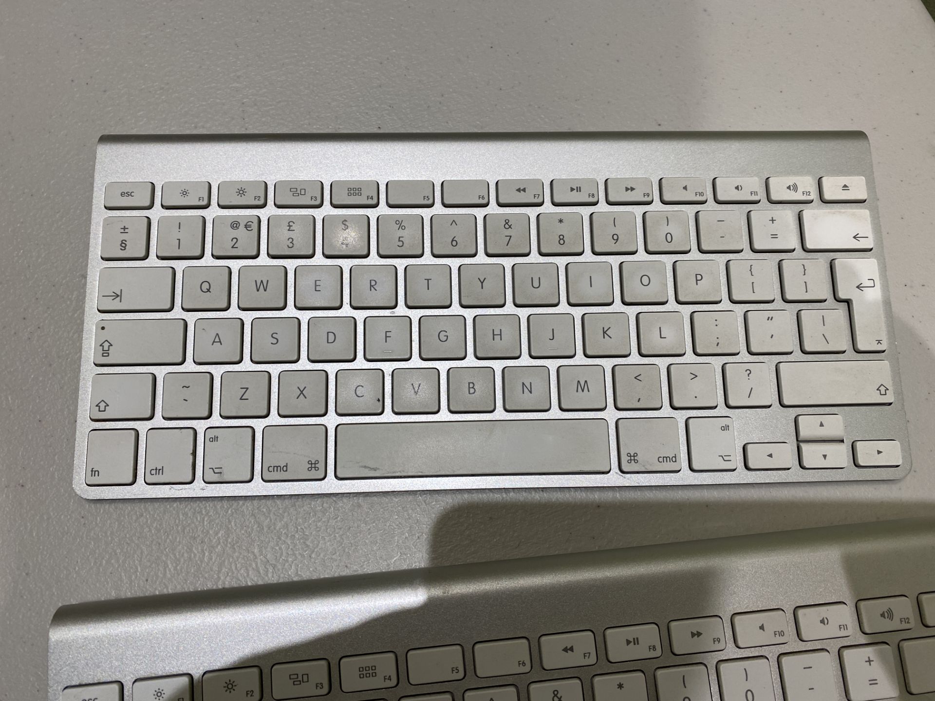 2:Apple Bluetooth Wireless Keyboards Silver/White - One Has Key Missing and Cap to Battery - Image 6 of 8