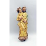Heiliger Josef mit JesusknabenHolz geschnitzt und farbig gefasst. Heiliger Josef, mit Lilie