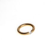 Niessing-Spannring750er Gelbgold mit Brillant ca. 0,25 ct. Gew.: ca. 9 g.Gr. 53.