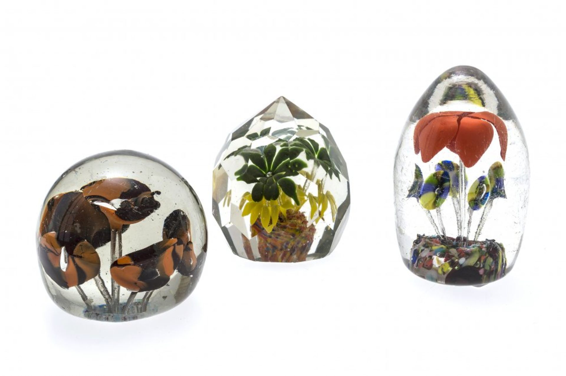 Three paperweights