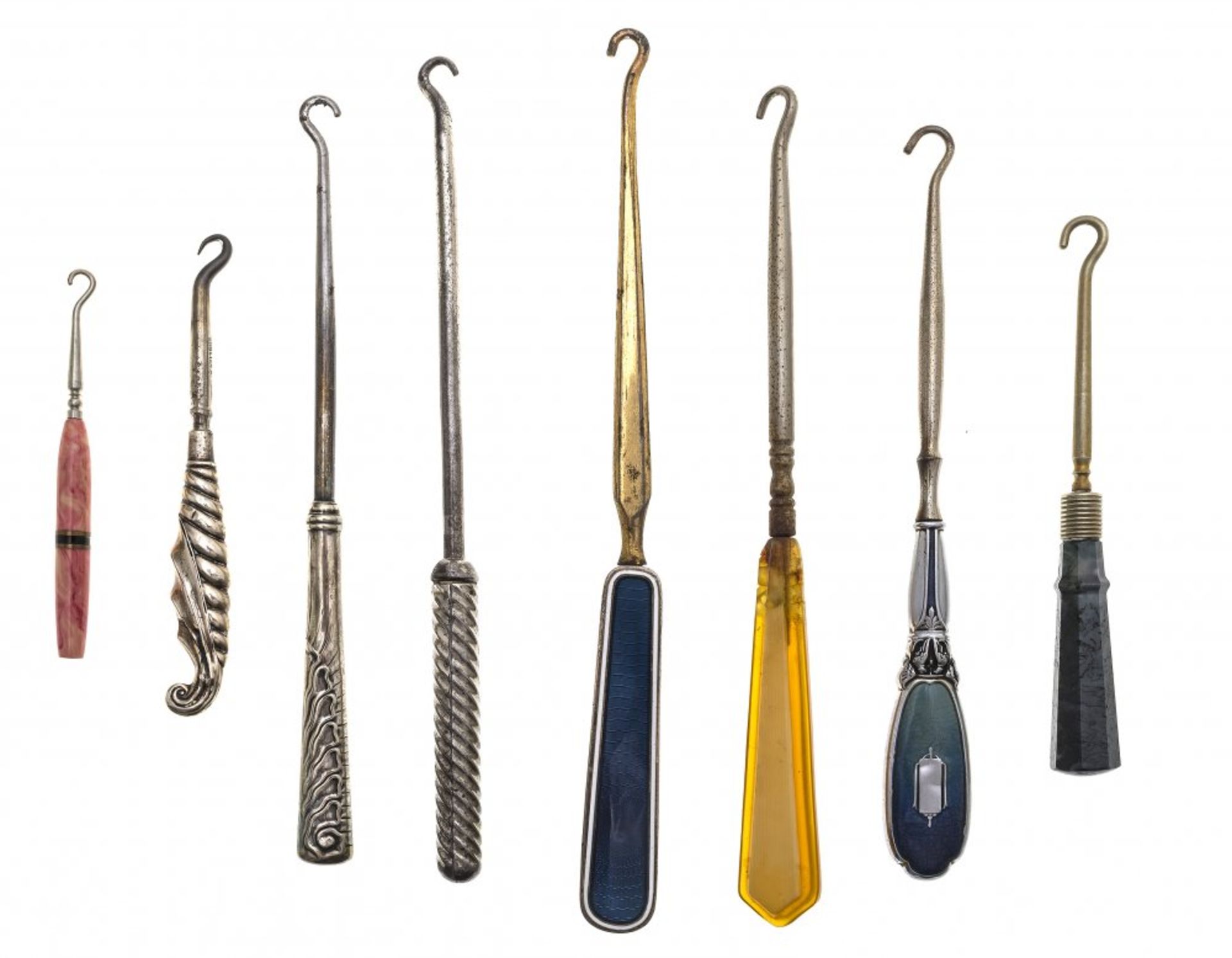 Eight shoe and glove pullers (button hooks)