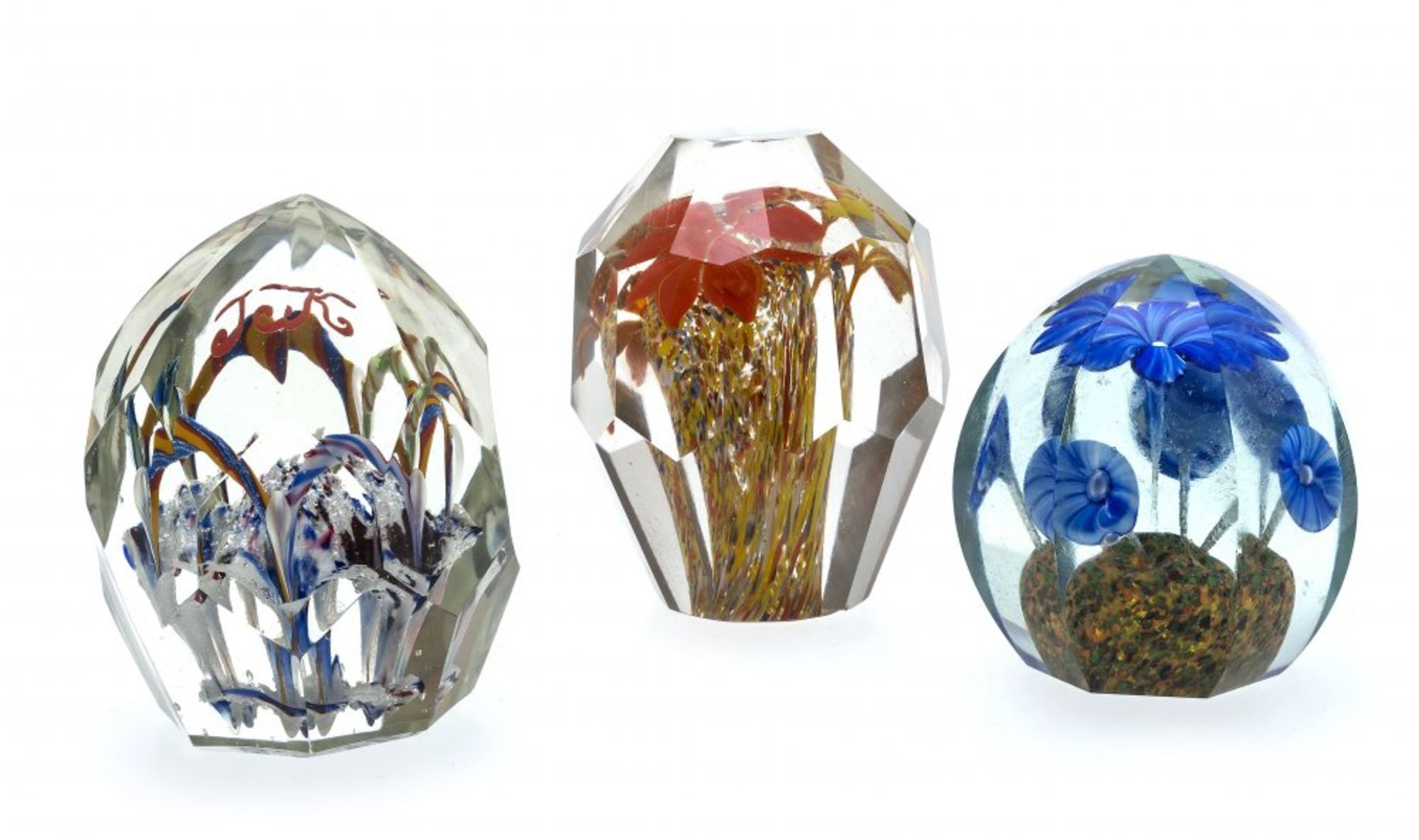 Three paperweights