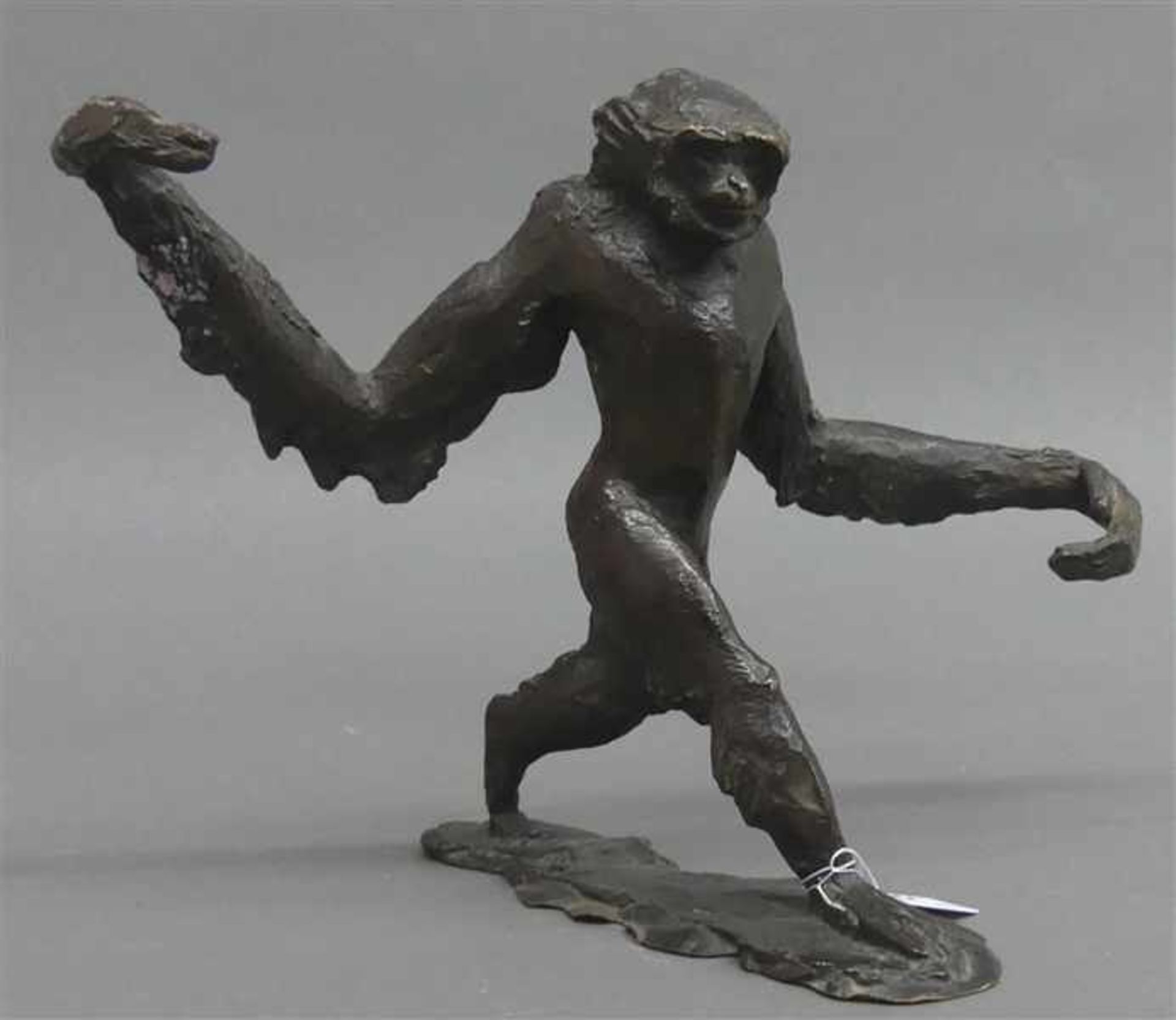 Bronzeskulptur laufender Gibbon, 20. Jh., h 19 cm,