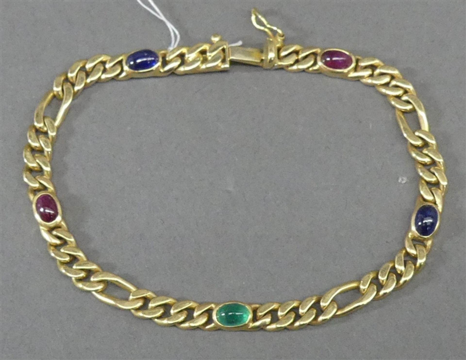 Armband 14 kt. Gelbgold, 5 Cabochons, Rubin, Saphir und Smaragd, Panzerform, Kastenschloss mit