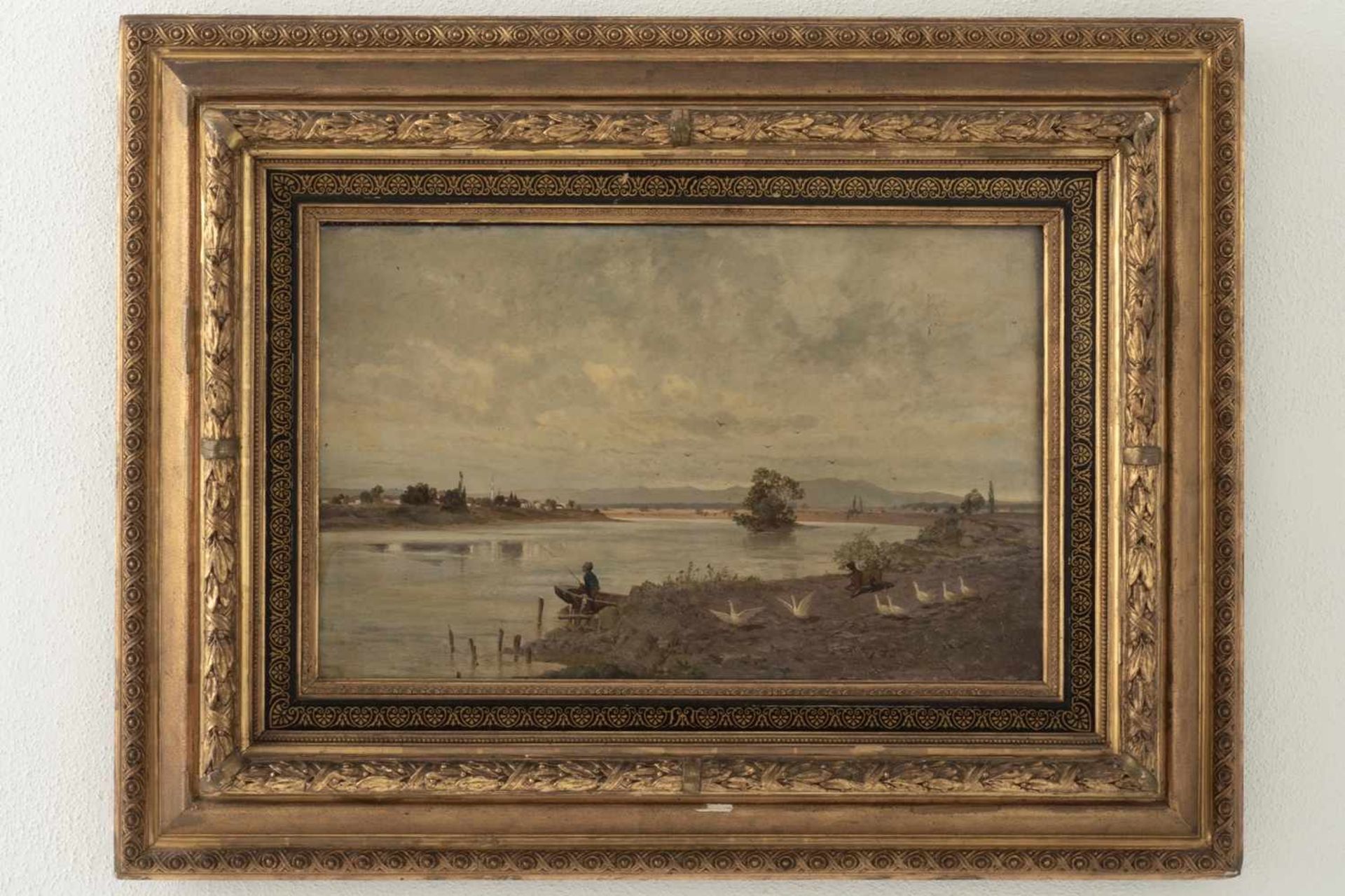 Landscape painting in ornate frame