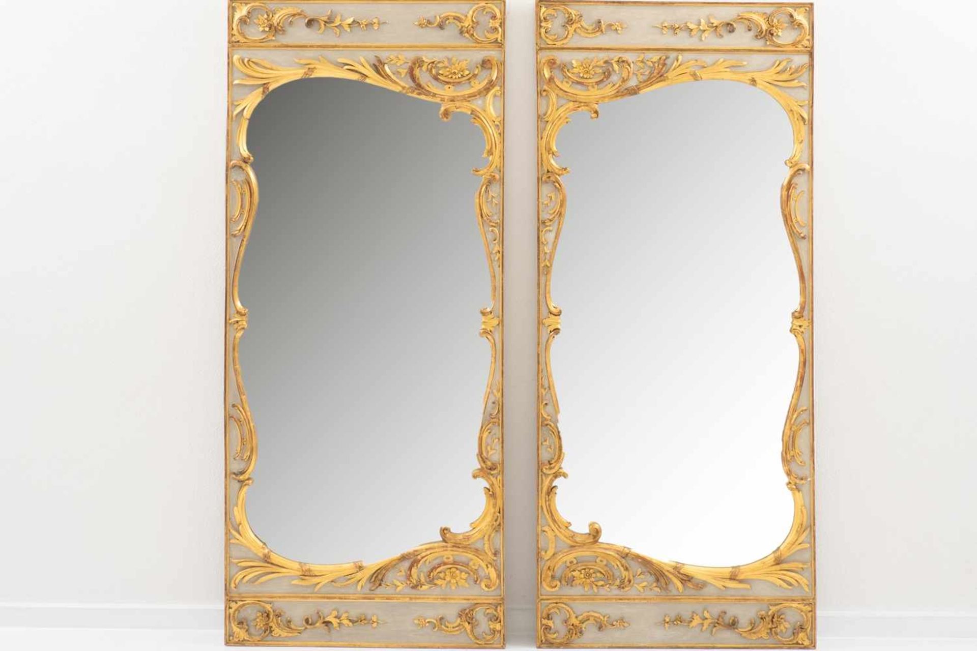 Pair of ornate mirrors with white and gold setting