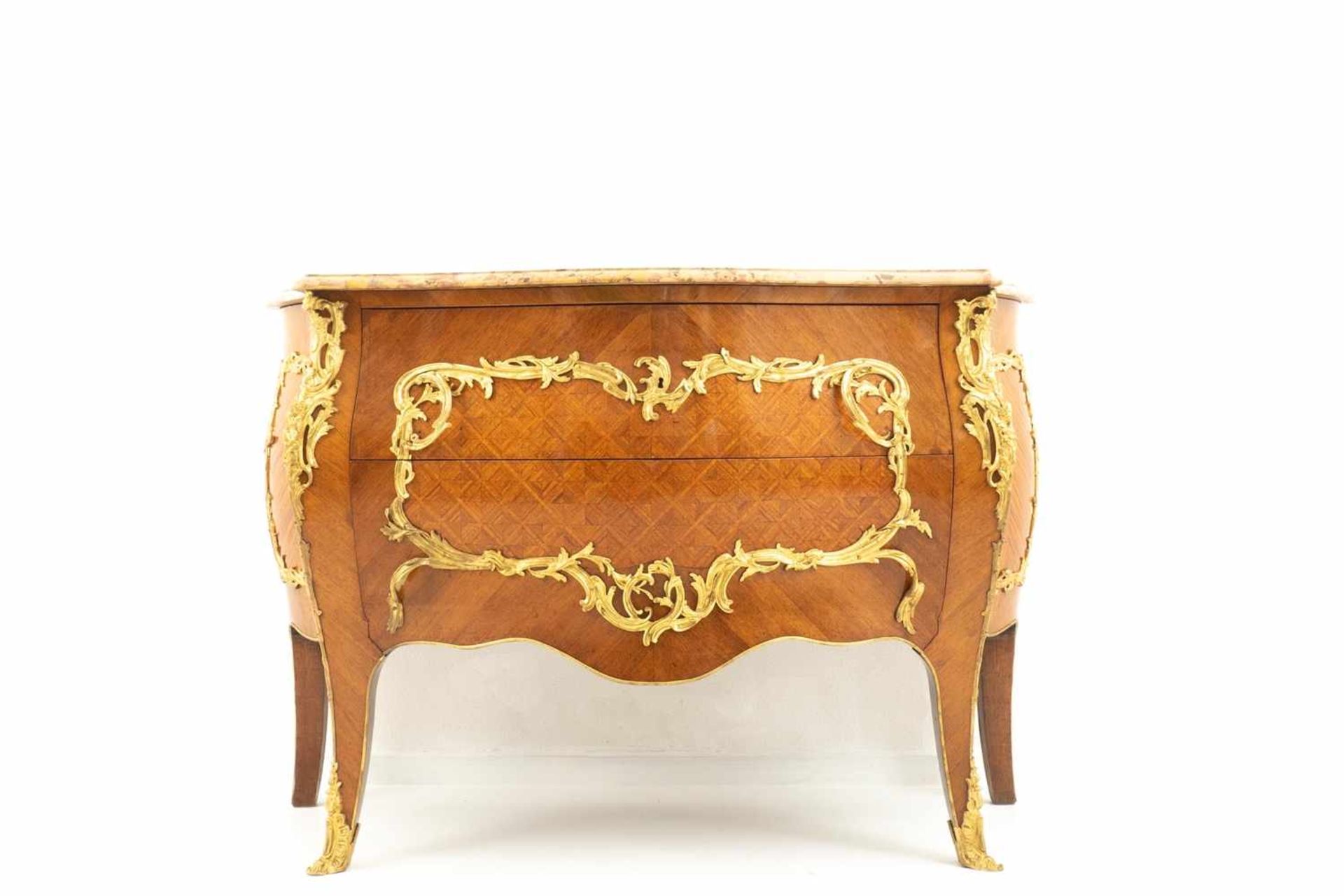Bulging ornate chest of drawers with bronze appliqué<