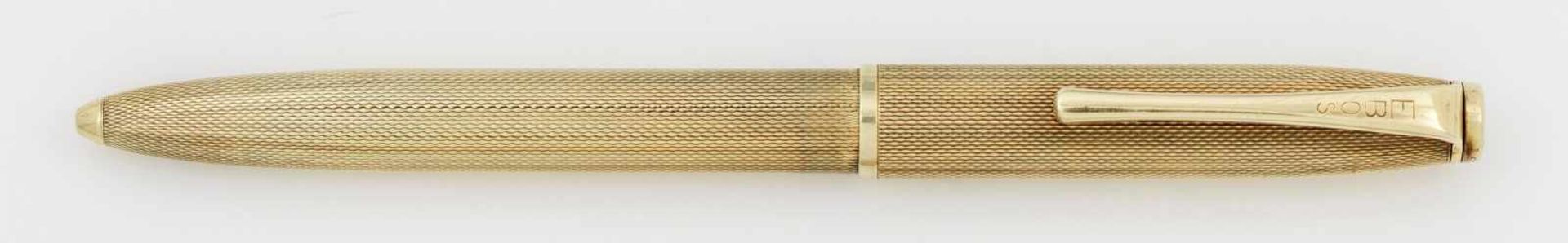 Kugelschreiber aus den 60er JahrenGelbgold, gest. 585. Schlanker, fein guillochierter Korpus. Gew.