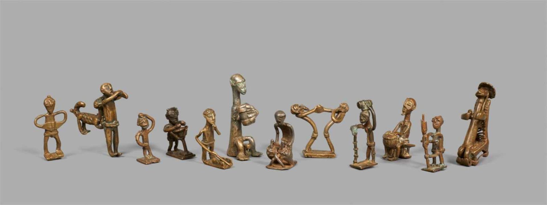 TWENTY-SEVEN AKAN BRASS GOLDWEIGHTSCast as figures