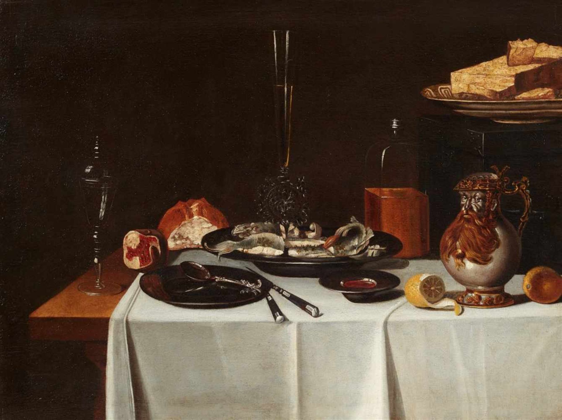 Netherlandish School, 17th centuryLarge Dinner Still Life with a Bellarmine, Venetian Glass,