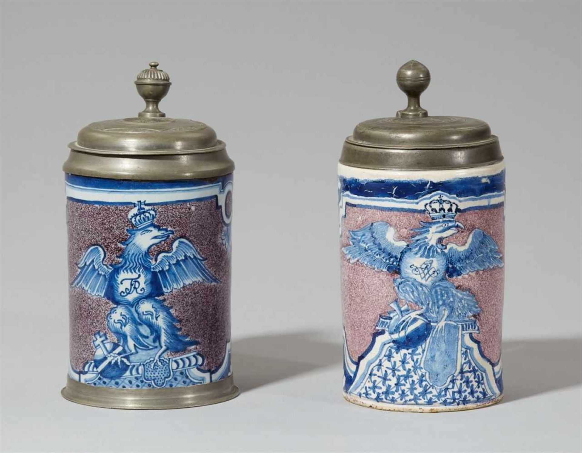 Two Berlin faience tankards commemorating two kingsDecorated with crowned eagles holding the