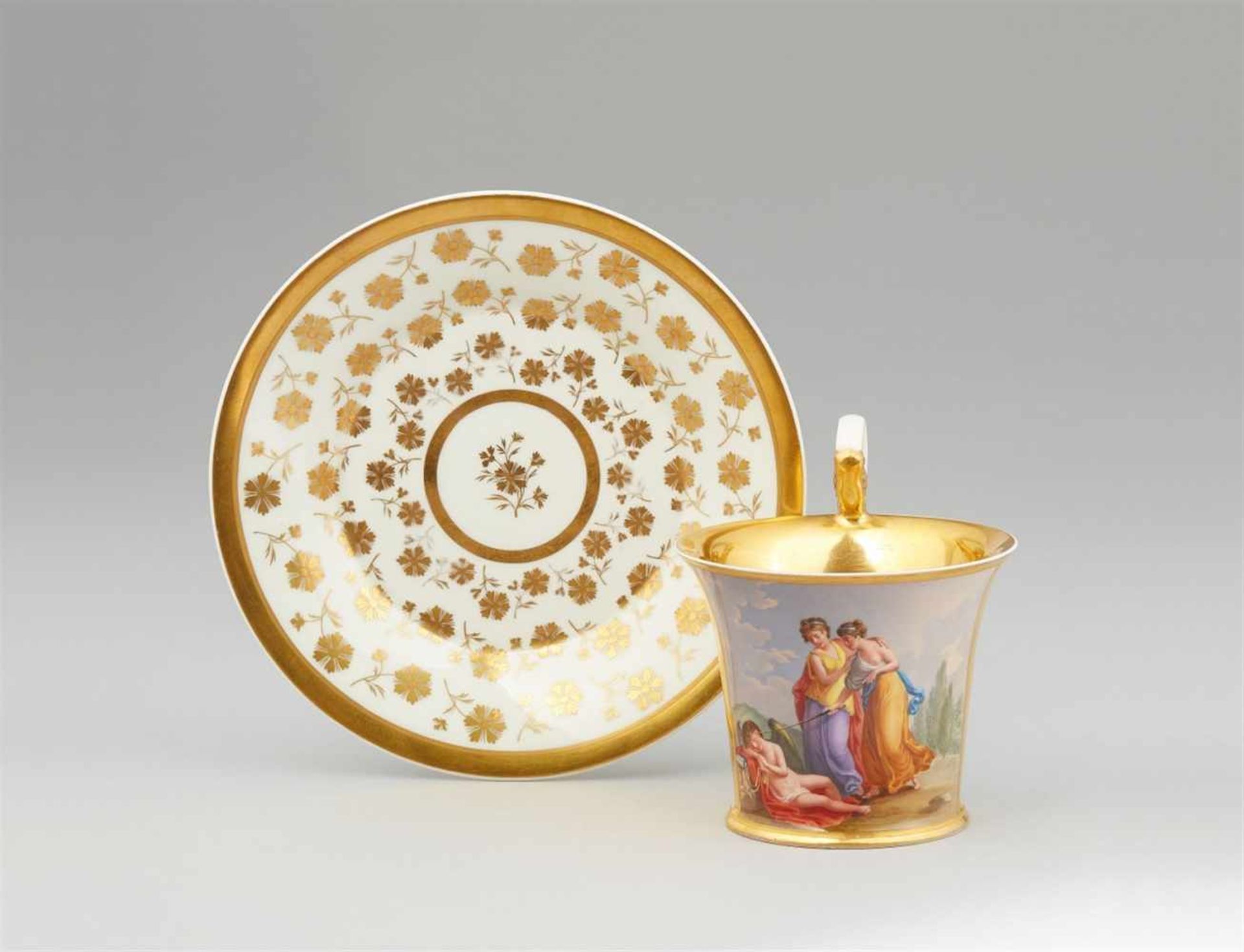 A Vienna porcelain cup and saucer with a motif after Angelika KauffmannBell-shaped cup with tall