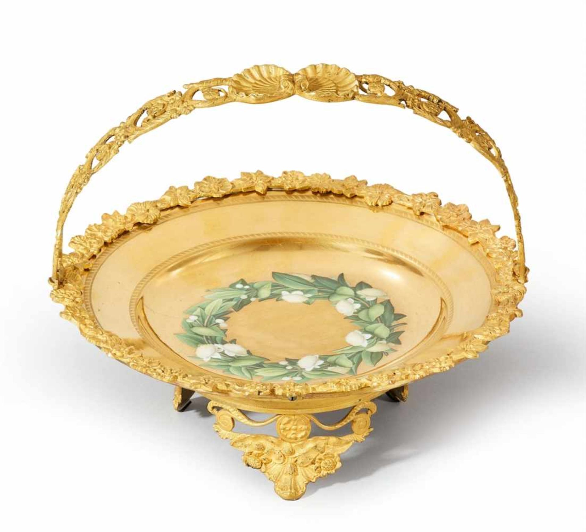 A Berlin KPM porcelain plate with bronze mountingsModel no. 1084. The well decorated with a finely